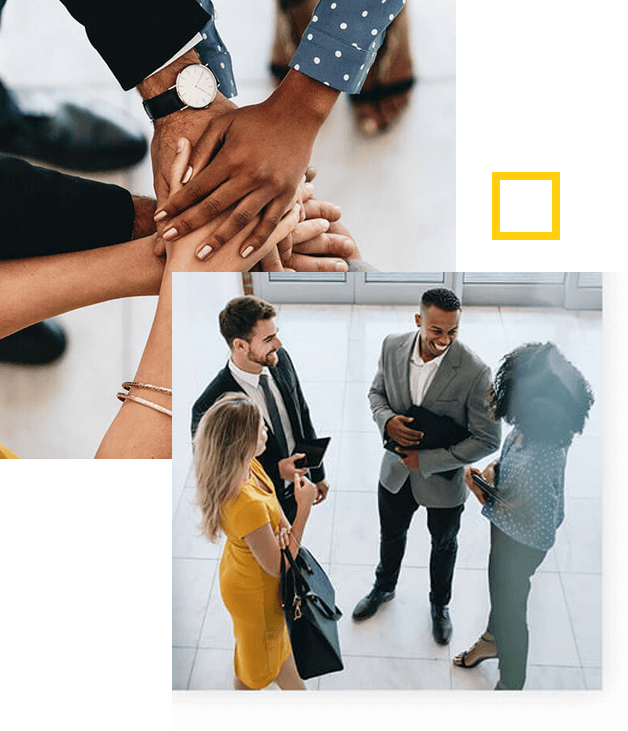 Four people in business clothes talking